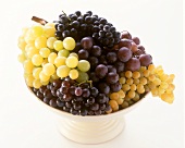 Green and red grapes in a fruit bowl