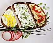Slices of bread with three different spreads