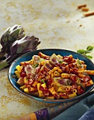 Rigatoni with artichokes, tomatoes and ham