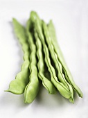 Green beans on a light background