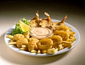 Fried seafood with dip on a plate