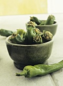Stuffed green chili peppers in two bowls
