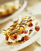 Filo pastry slice with yoghurt mousse, raspberries & chocolate