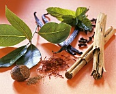 Various spices on a red background