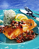 Salmon fillet with tomatoes, olives and rice