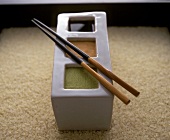 Soy sauce and pastes for sushi in a three-compartment bowl