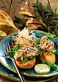 Herb butter baguette with fried tuna fillets