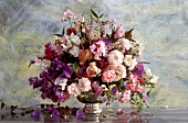 Summer bouquet of roses, sweet peas and convolvulus