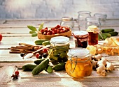 Still life with bottled vegetables, jams & ingredients