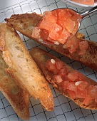 Preparing bruschetta