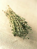 A bunch of thyme on a jute background