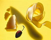 Ribbon noodles, parmesan & olive against yellow background