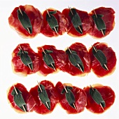 Raw veal escalope with sage and ham (saltimbocca)