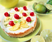 Lime gateau with raspberries and lemon balm