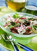 Red onion salad with blue-veined cheese and parsley