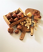 Jerusalem artichokes in crate and on chopping board