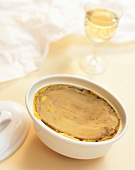 Foie gras terrine in white terrine dish