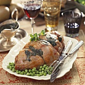 Lamb roulade with mint and peas