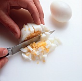 Chopping boiled eggs