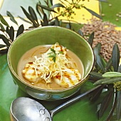 Stuffed scallops on creamed lentil soup