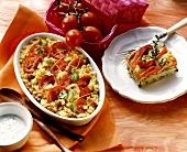 Tomato and couscous bake and pepper and red perch gratin
