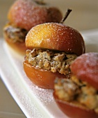Baked apples with marzipan & almond filling and icing sugar