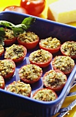 Stuffed tomatoes in blue baking dish