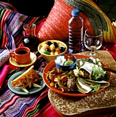 Mexican menu with tortillas, fruit salad, coffee etc