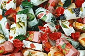 Lots of coloured sweets (filling the picture)
