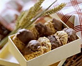 Oat biscuits with chocolate icing in a box