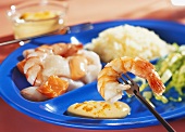 Seafood fondue with saffron mousse and rice