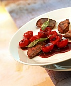 Fried chicken liver with balsamic cherries and sage