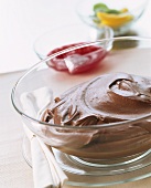 Chocolate mousse with raspberry pulp and fruit salad