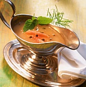 Grapefruit sauce with green pepper in sauce-boat