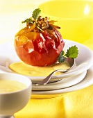 Baked apple with nougat filling and custard