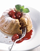 Baked ginger pudding with Morello cherry sauce