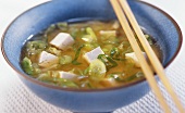 Miso soup with tofu and spring onions