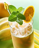 Fruit shake with banana ice cream and lemon balm