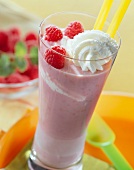 Raspberry milkshake with cream