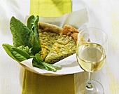 Herb and soft cheese quiche with sorrel; white wine