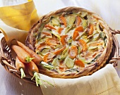Carrot and leek tart with pine nuts; fresh carrots