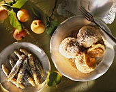 Apricot dumplings & poppy seed noodles with icing sugar