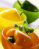Peppers in coloured bowls