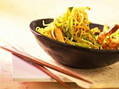 Fried noodles with honey, vegetables and shrimps