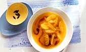 Orange and liquorice soup; liquorice diamonds