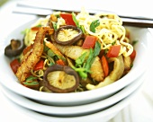 Asian noodles with mushrooms, chicken and vegetables