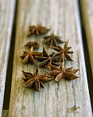 Star anise on wooden background