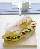 Baguette with brie, spinach and tomatoes