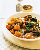 Lamb and carrot stew with prunes