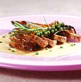 Duck breast with green pepper cream and rosemary